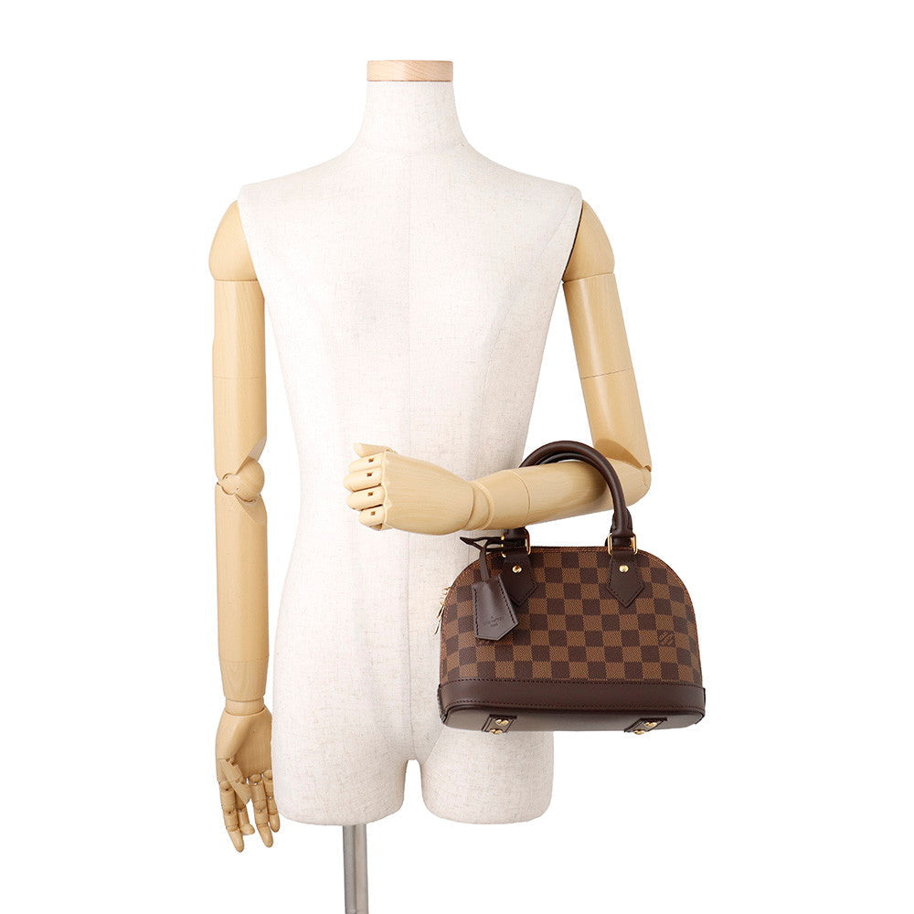 Louis Vuitton Alma BB Bag in Damier Ebene Canvas with Gold-Tone Hardware
