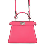 Fendi Peekaboo ISeeU Petite pink leather bag with top handle, shoulder strap and silver-tone twist lock, front view