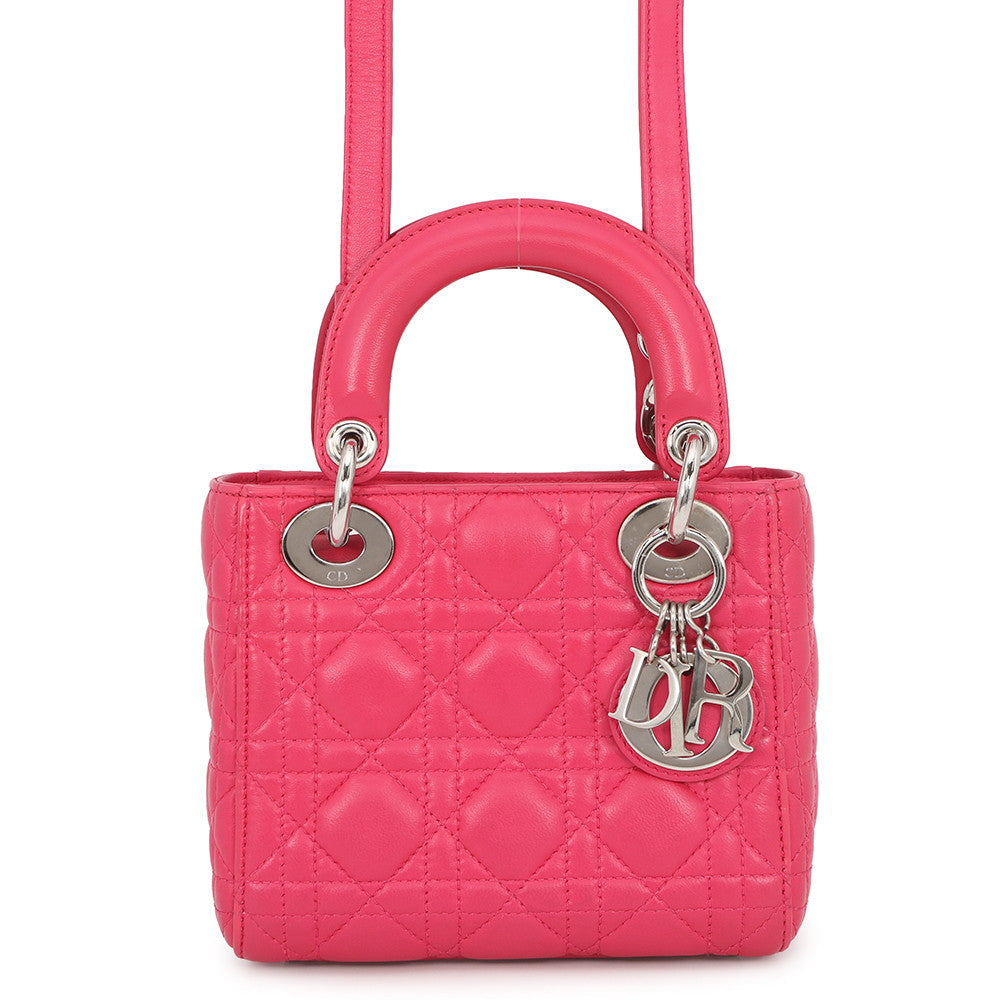 Mini Lady Dior pink Cannage leather bag with rounded top handles, silver-tone D.I.O.R. charms and matching shoulder strap, front view