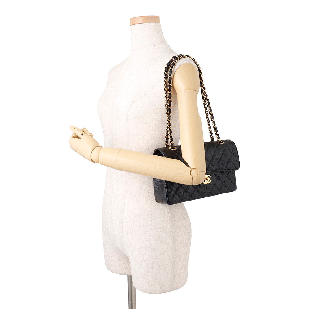 Chanel Small Classic Flap Bag in Black Caviar Leather with Gold-Tone Hardware