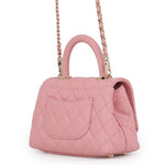 CHANEL Coco Handle Mini in Pink Caviar Leather with Gold-Tone Hardware Back view and Back pocket 