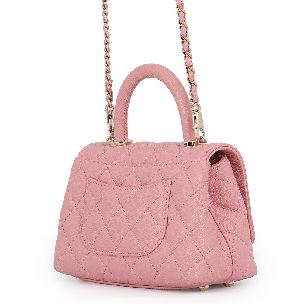 CHANEL Coco Handle Mini in Pink Caviar Leather with Gold-Tone Hardware Back view and Back pocket 