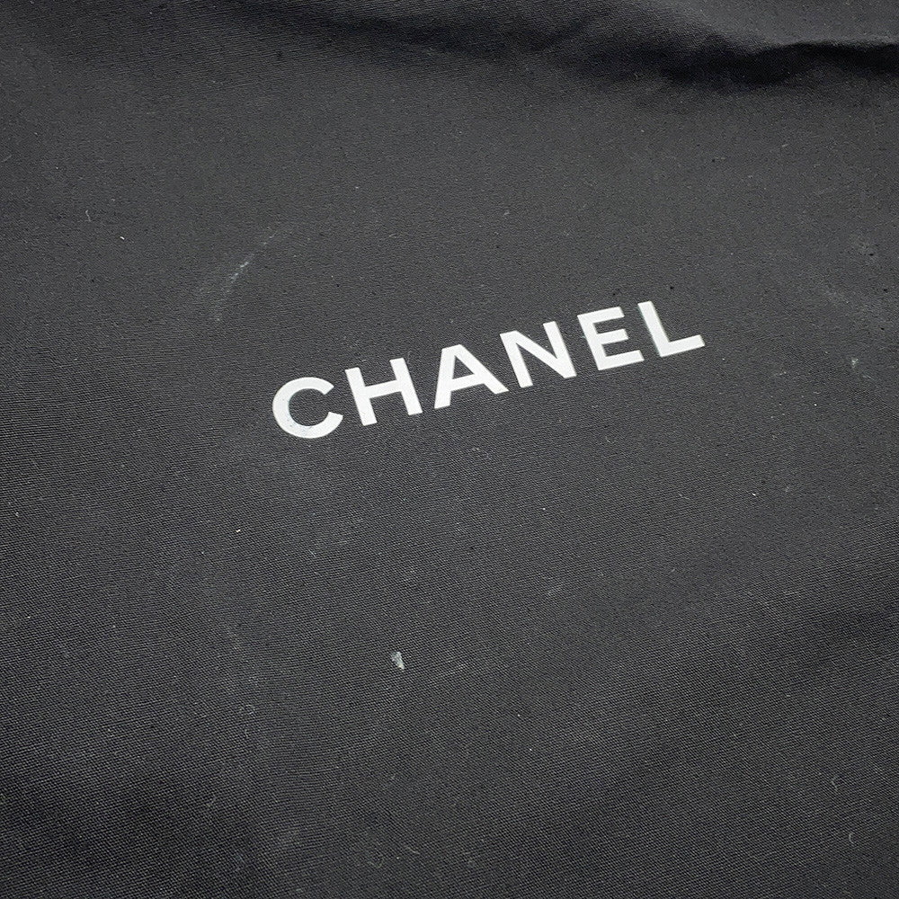 Close up of CHANEL Black dustbag with Brand name on it 