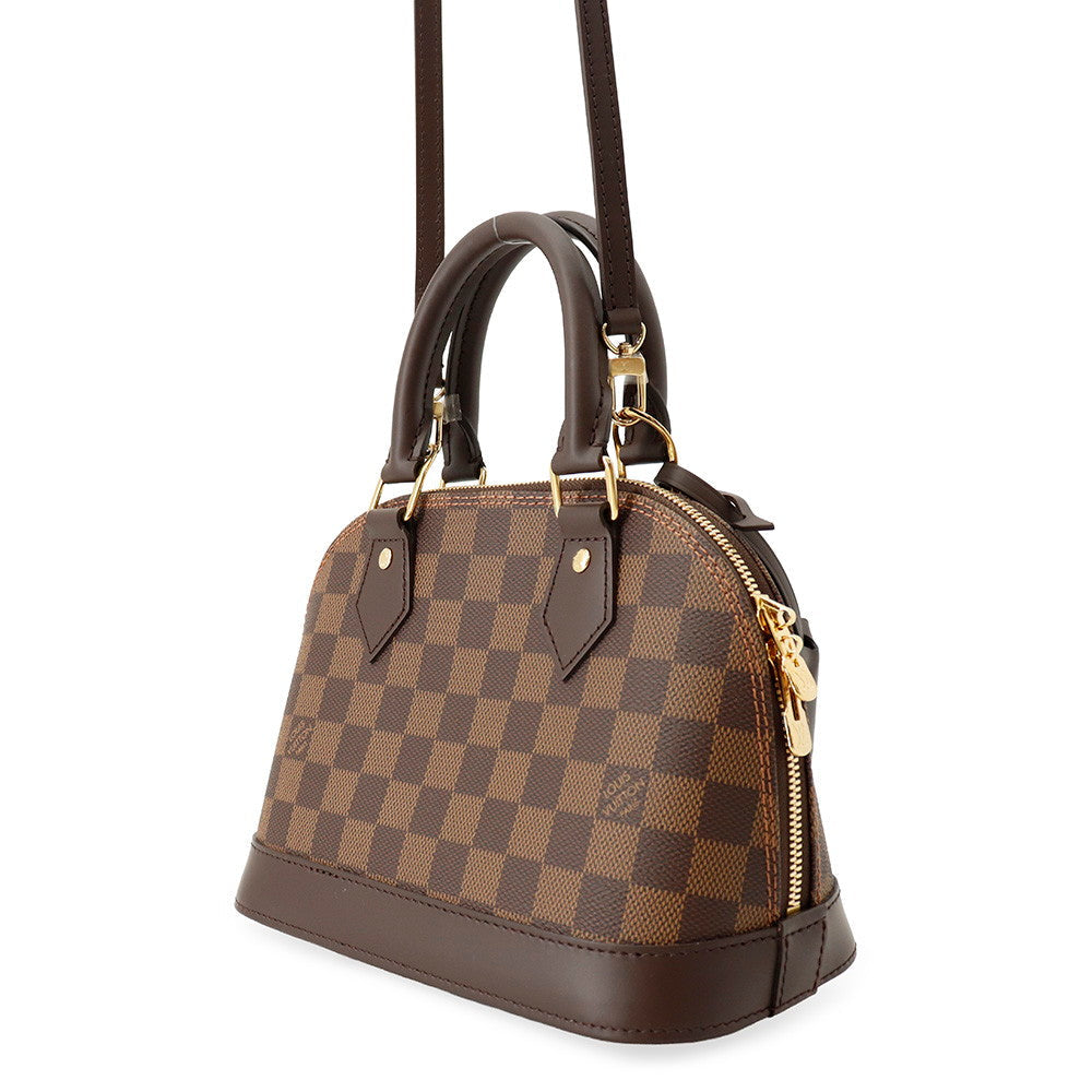 Louis Vuitton Alma BB Bag in Damier Ebene Canvas with Gold-Tone Hardware