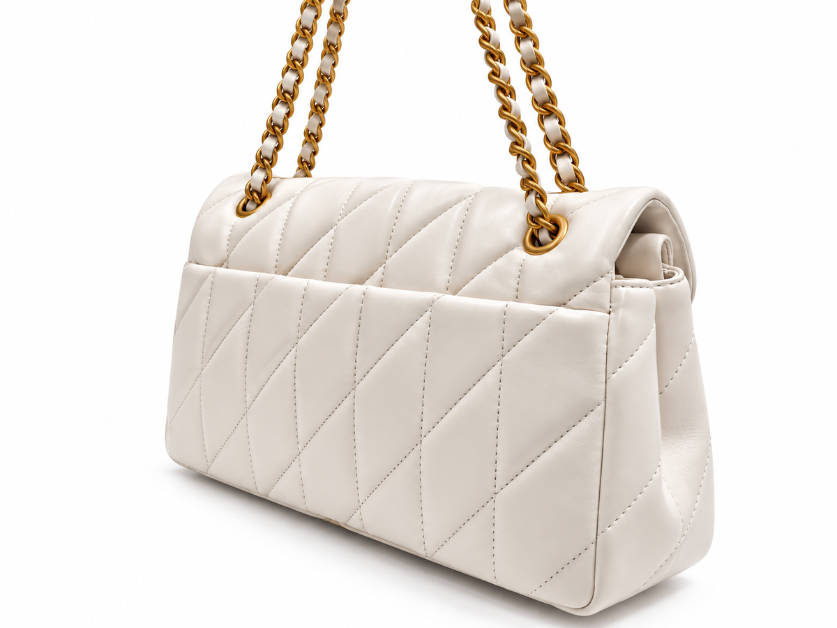 Coach Quilted Tabby Shoulder Bag 26 back side view showing exterior slip pocket and chain straps⁠