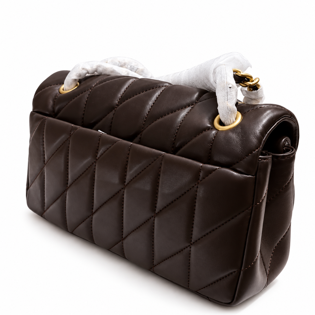 Coach Quilted Tabby 26 shoulder bag in maple color showing its back side view featuring exterior slip pocket and diagonal quilting⁠