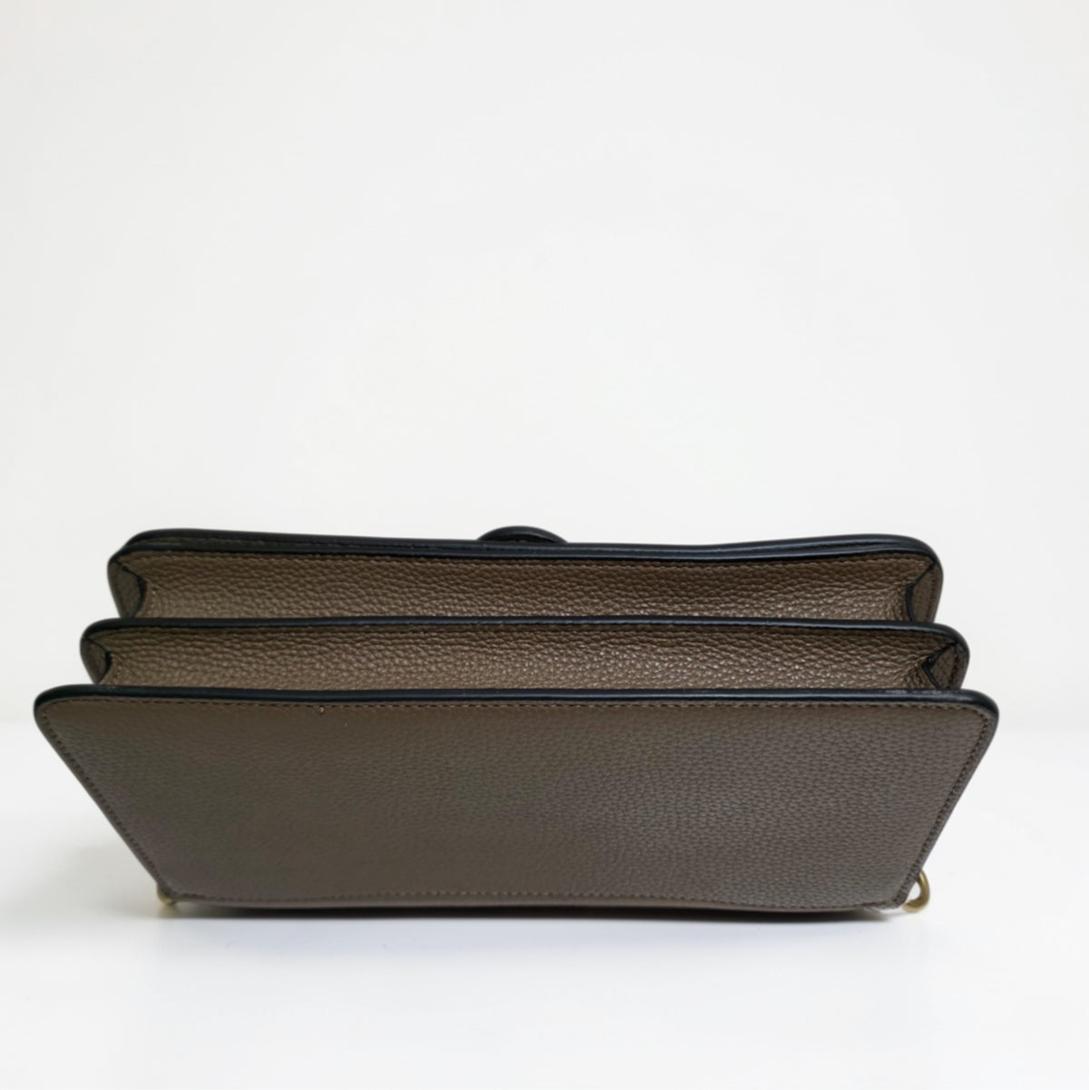 Bottom view of COACH Tabby 26 in Dark Stone pebble leather