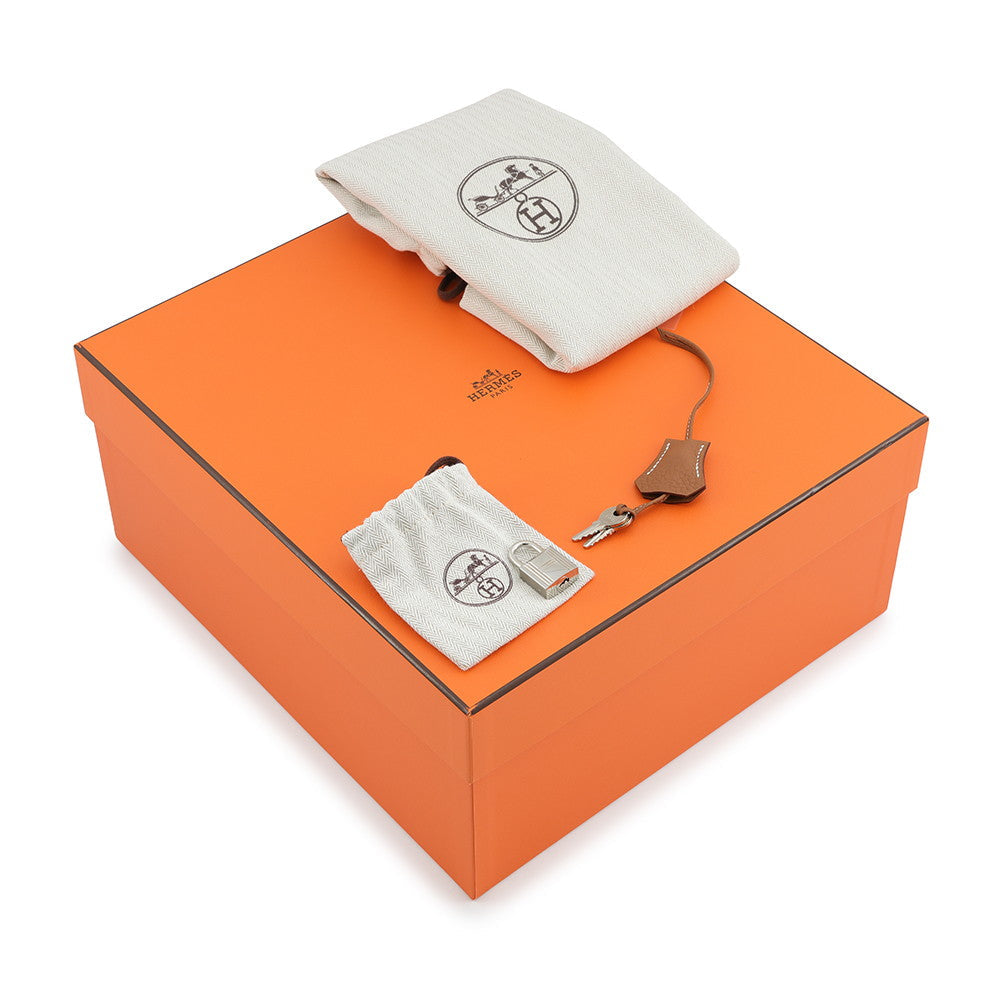 Hermès orange box with herringbone dustbags, lock, clochette, and keys