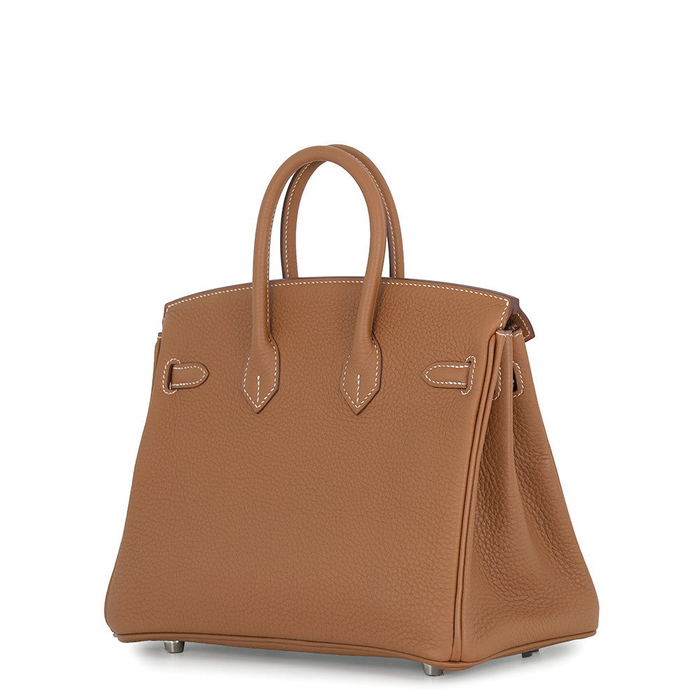 Side view of Hermès Birkin 25 in Gold Togo leather showing side sangles and structure
