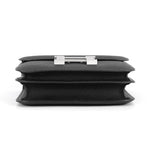 Bottom view of the black Epsom Hermès Constance 18 showing double compartment gusset design.