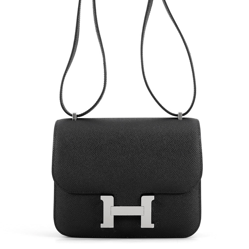 Front view of the Hermès Constance 18 in Noir Black Epsom leather with silver Palladium H clasp