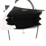 Inside open compartment of Hermès Kelly Sellier 25 Black Epsom leather handbag