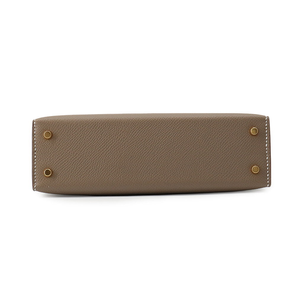 Hermès Mini Kelly 20 bottom base view showing gold protective feet⁠