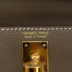 Hermès Mini Kelly 20 Étouppe Epsom gold foil logo stamp and yellow gold hardware turnlock with protective seal⁠