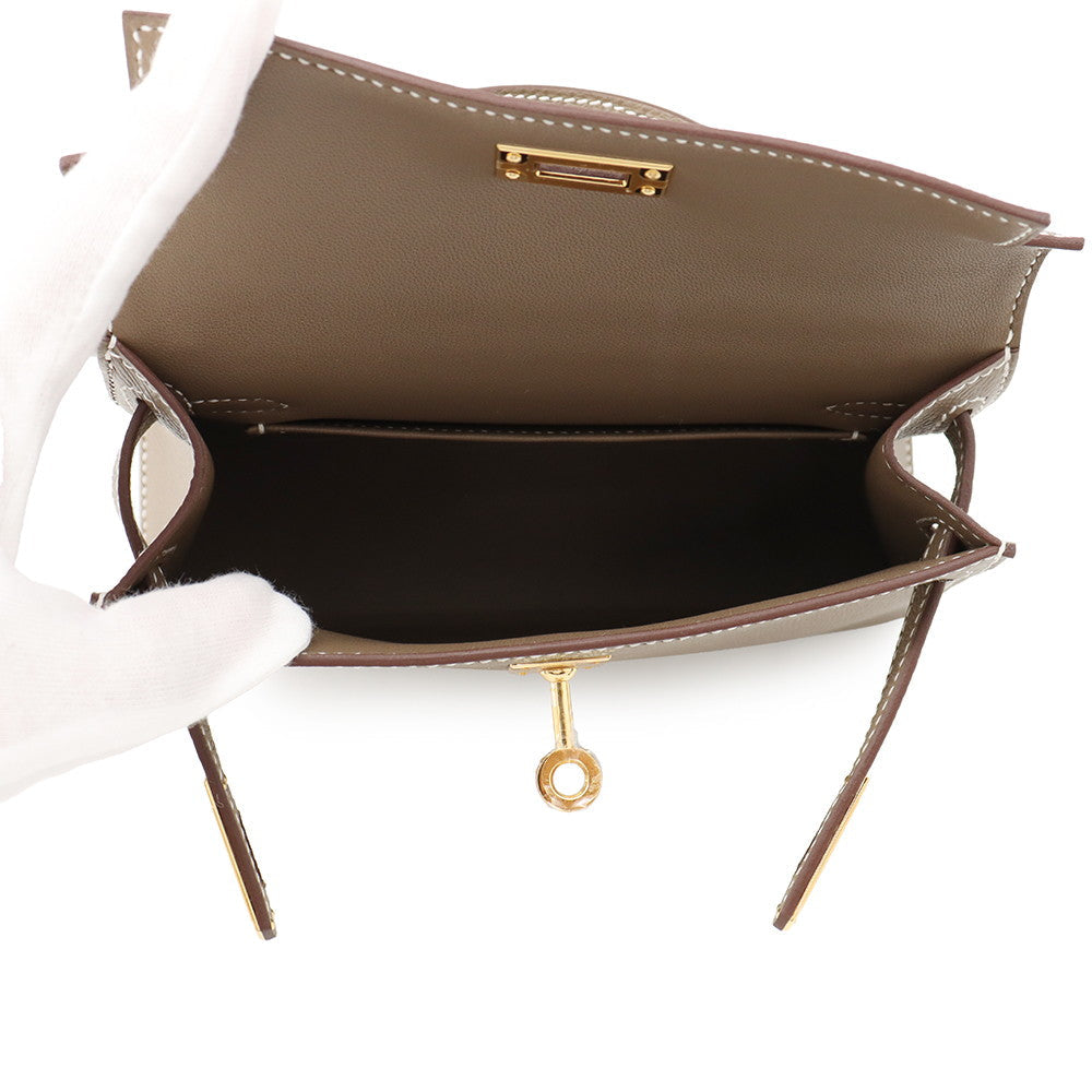 Hermès Mini Kelly 20 top down open view displaying interior compartment⁠