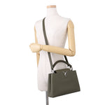 Louis Vuitton Capucines BB bag in Khaki displayed crossbody on mannequin