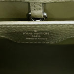 Silver foil heat stamp reading Louis Vuitton Paris Made in France on Khaki leather