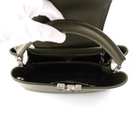 Top-down view into open compartments of Louis Vuitton Capucines BB bag