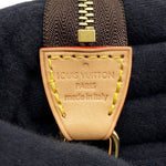 Louis Vuitton Paris Made in Italy heat stamp on vachetta leather tab⁠