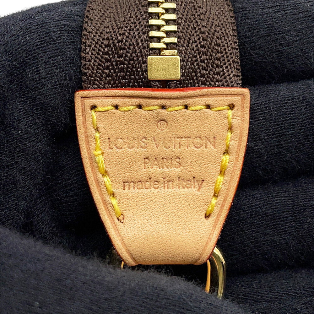 Louis Vuitton Paris Made in Italy heat stamp on vachetta leather tab⁠