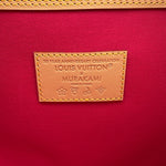 Close-up of interior leather patch reading 20 Year Anniversary Celebration Louis Vuitton x Murakami made in France