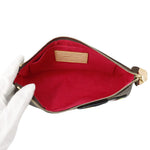 Louis Vuitton Murakami Panda Pochette open interior view displaying red microfiber lining