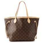 Louis Vuitton Neverfull MM tote bag in Monogram coated canvas with Vachetta leather handles front view