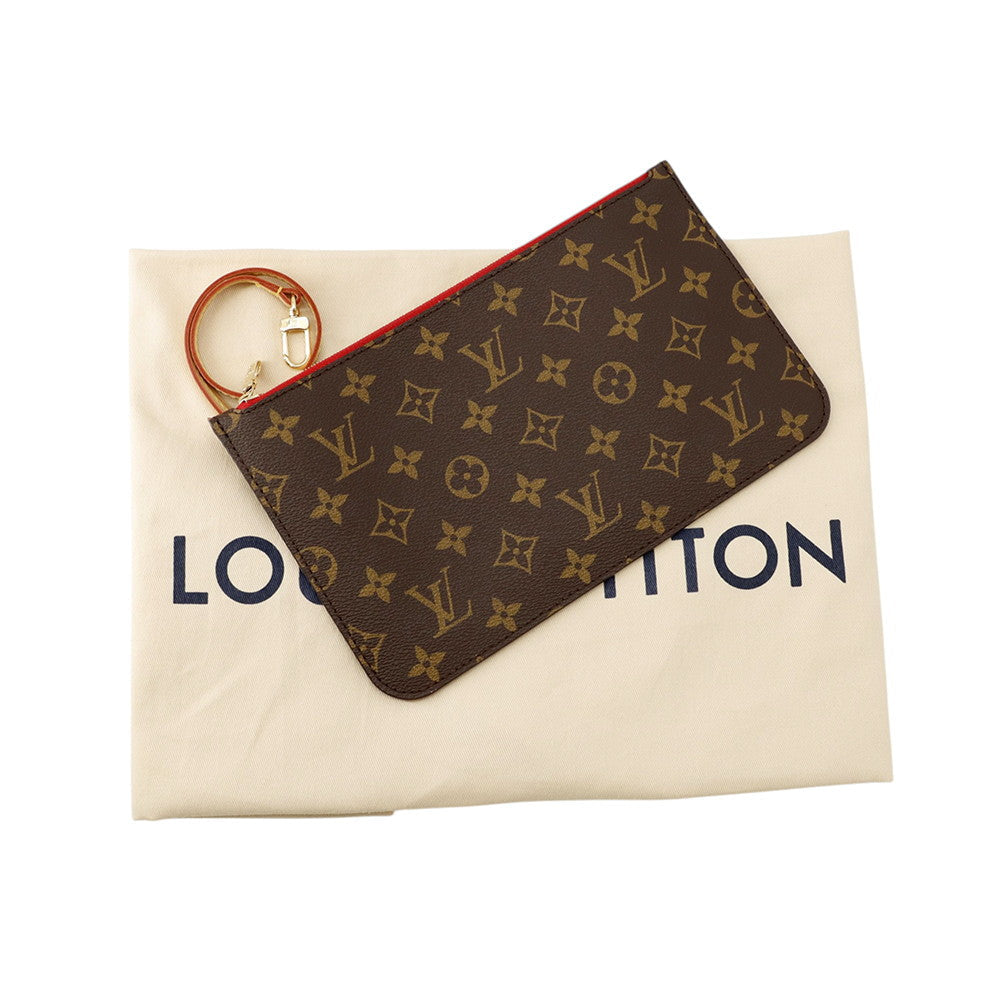 Louis Vuitton Neverfull MM matching Monogram removable zipped pouch resting on original dustbag