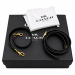 Included accessories for the preowned Coach Chain Tabby set, featuring interchangeable straps, dust bag, and box